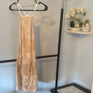 Lace overlay mini dress with cutout back and thigh slits